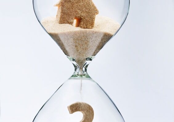 hourglass money sand